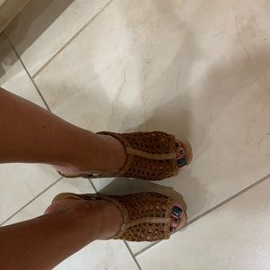 Tan wedge heels by Mark and James.